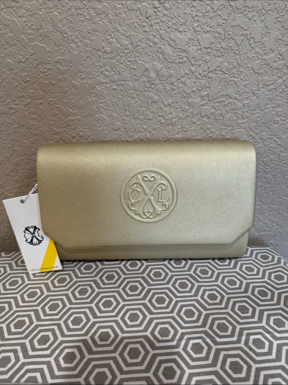 Christian Lacroix Metallic Gold Embossed Logo Clutch